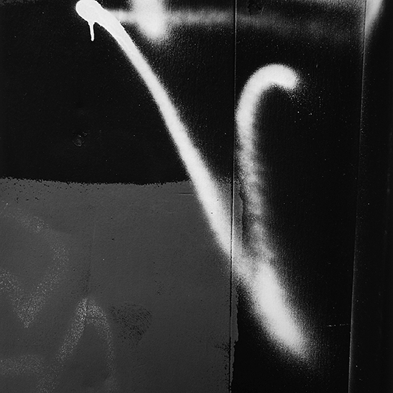 photograph of graffiti in the shape of a V by Alan Ostreicher