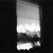 Alan Ostreicher photograph of an open window at night